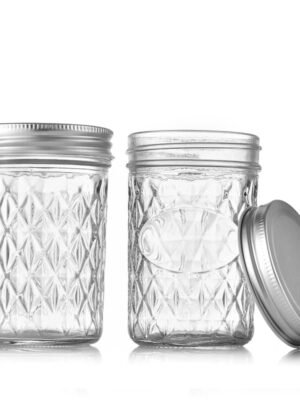 Classic quilted pattern 8oz regular mouth mason jar with metal lid.