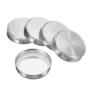 Airtight food grade stainless steel mason jar lids in 70mm and 86mm sizes, creating a seal on glass jars.