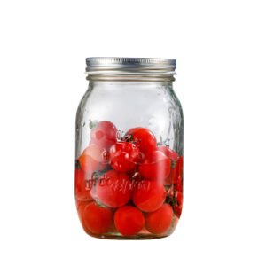 Embossed 32oz wide mouth glass mason jar with decorative pattern and metal lid.