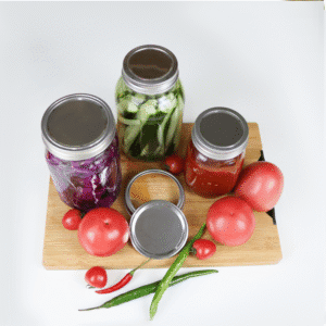 Close-up detail of the rust-proof stainless steel construction and precise threading on the mason jar band.