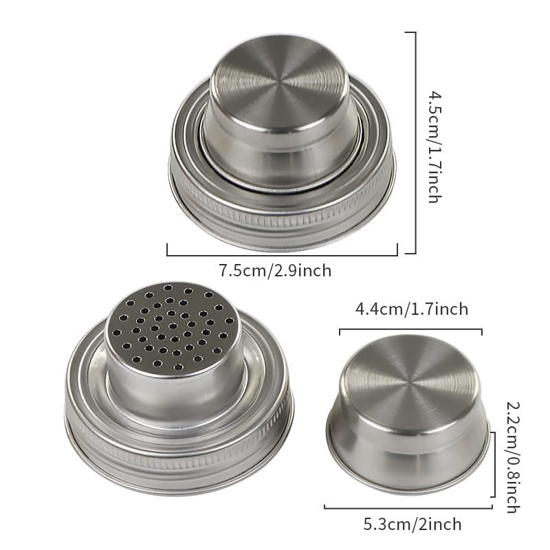 Close-up of the built-in fine strainer in the cocktail shaker lid, showing detail.