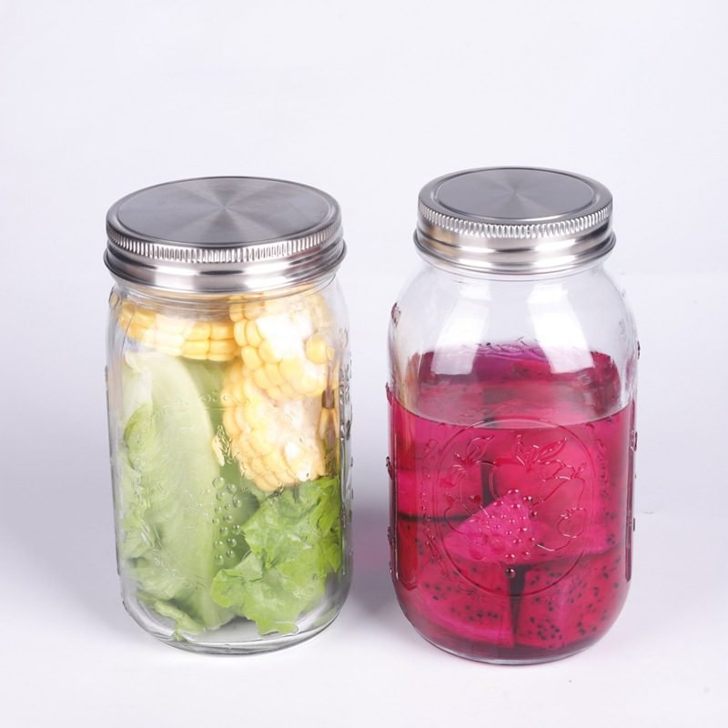 Airtight food grade stainless steel mason jar lids in 70mm and 86mm sizes, creating a seal on glass jars.