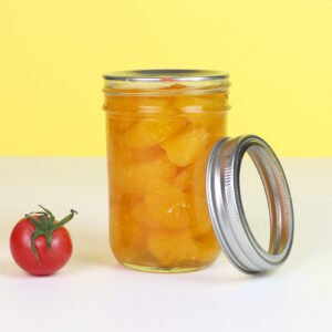 Elegant tapered 8oz (250ml) glass mason jar with metal lid showing contoured silhouette.