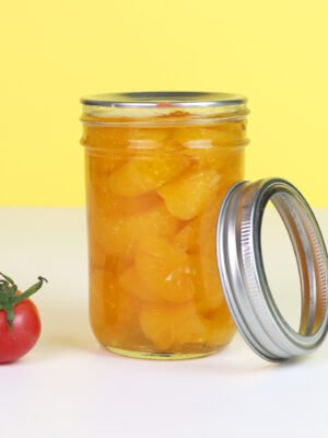 8oz-tapered-mason-jar-for-foods-(4) Elegant tapered 8oz (250ml) glass mason jar with metal lid showing contoured silhouette.