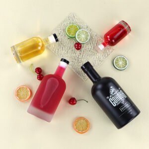 Flint Nordic round glass liquor bottle with bar top neck finish.