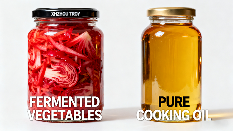 A image showing one side with Troy's clear jars filled with pickles and another with amber jars filled with oil, highlighting the different use cases.